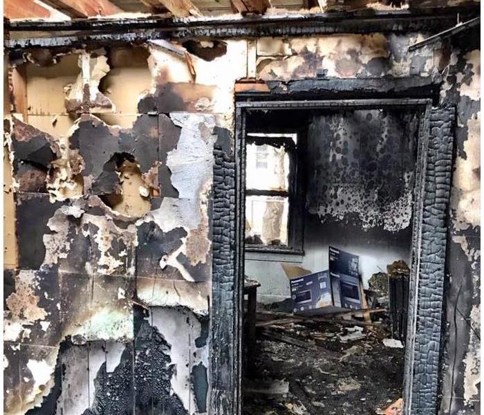 Severe interior fire damage in home.