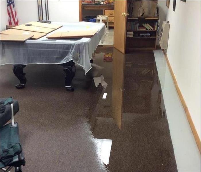 Standing water on carpet of an office